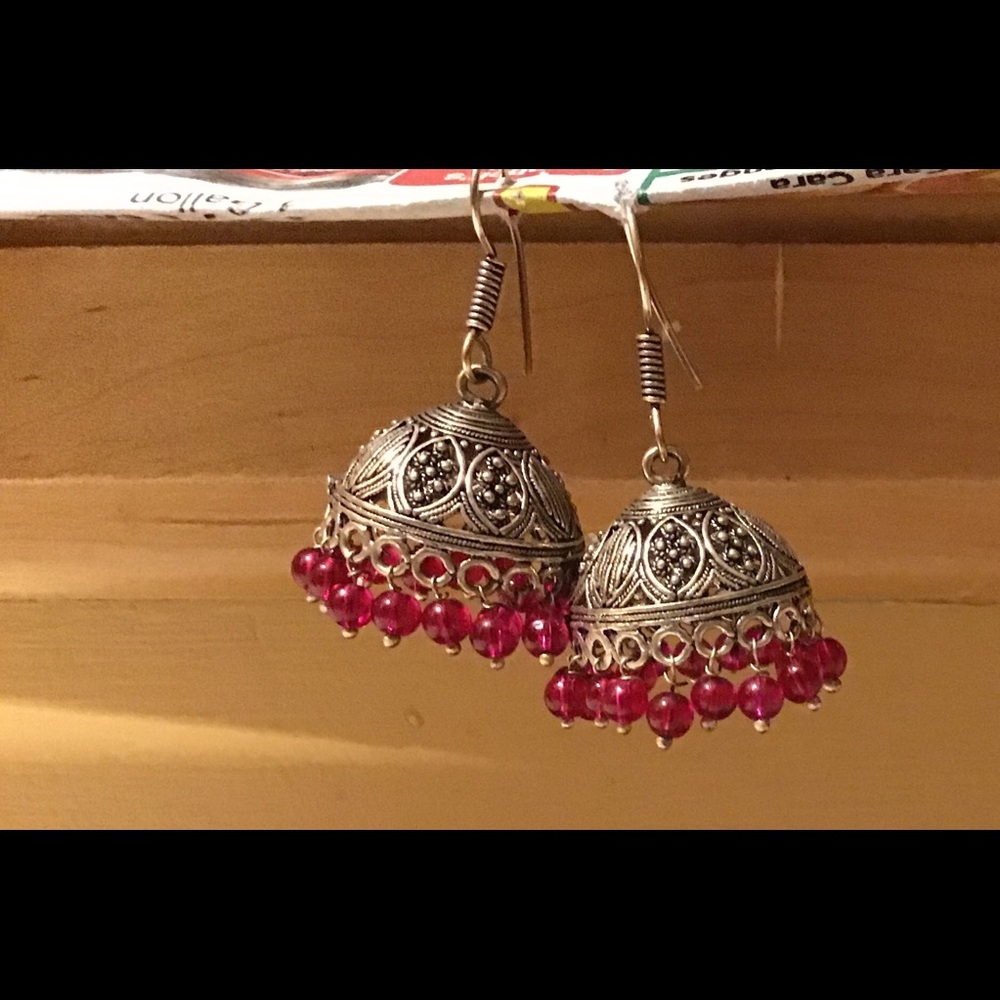Jhumka earrings.